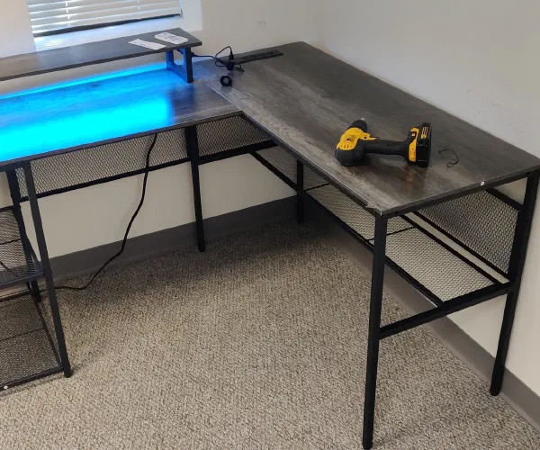 Completed illuminated L-shaped desk
