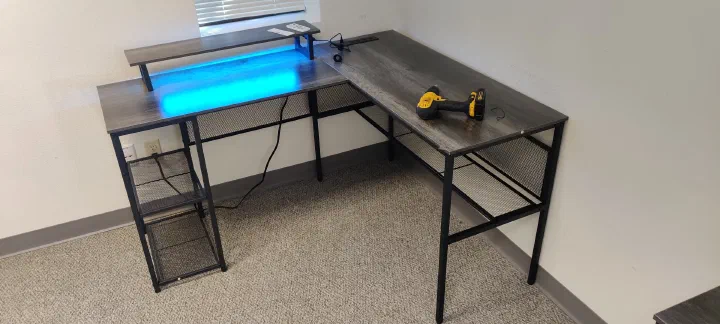 Completed illuminated L-shaped desk