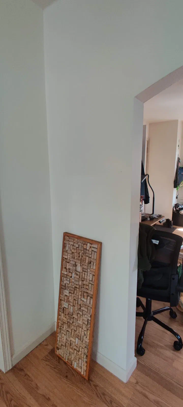 Wall before mounting a carved wood art panel